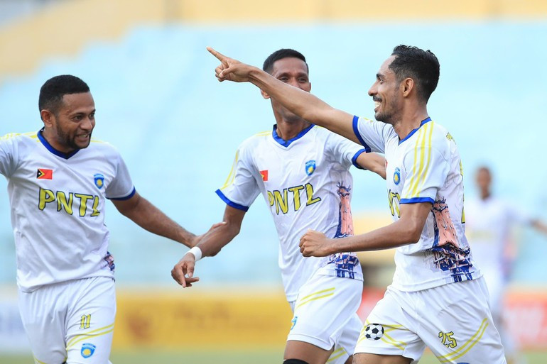 Timor-Leste players jubilantly celebrate an equalising goal against Cambodia. bd2.jpg