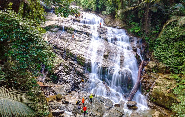 Tourists ziplining and crossing the Duong Cam waterfall in the Dong Chau–Khe Nuoc Trong Nature Reserve. a1-8533-9316.jpg
