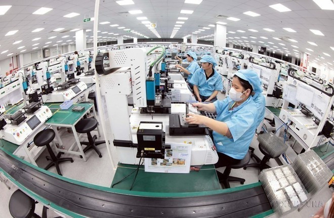 An electronics manufacturing production line at Khvatec Thai Nguyen Co., Ltd (Photo: VNA)