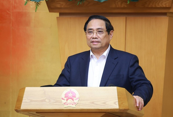 Prime Minister Pham Minh Chinh speaks at the Government's montly regular meeting on February 4. (Photo: VNA)