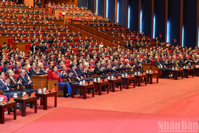 Current and former Party and State leaders and delegates attend the opening session of the Congress.