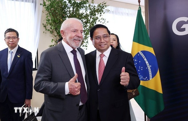 Prime Minister Pham Minh Chinh (R) and Brazilian President Lula da Silva (Photo: VNA) Prime Minister Pham Minh Chinh (R) and Brazilian President Lula da Silva (Photo: VNA)