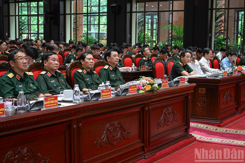 General Phan Van Giang and delegates at the conference. qut.jpg