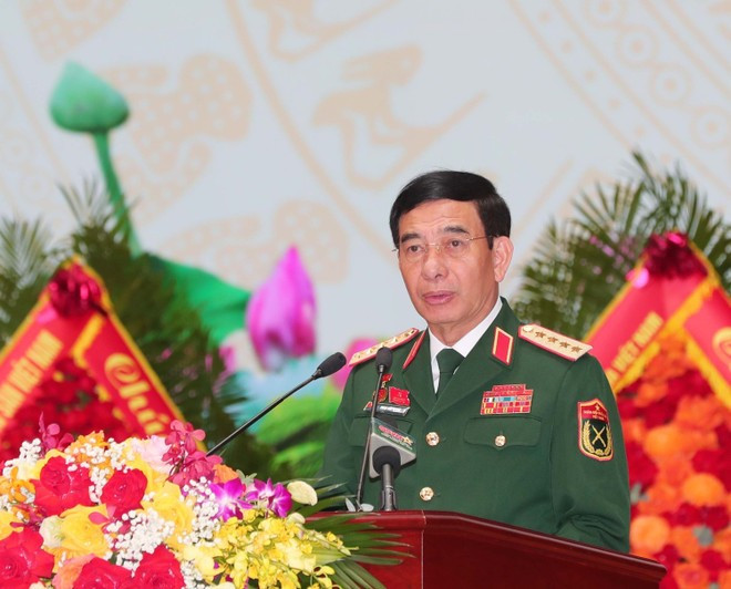 General Phan Van Giang, Deputy Secretary of the Central Military Commission and Minister of National Defence, presents the political report at the congress. (Photo: VNA) General Phan Van Giang, Deputy Secretary of the Central Military Commission and Minister of National Defence, presents the political report at the congress. (Photo: VNA)