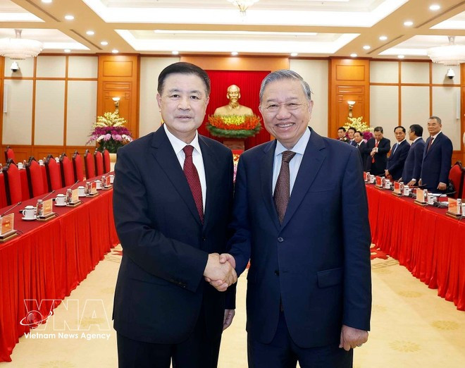 Party General Secretary To Lam welcomes Chinese Minister of Public Security Wang Xiaohong. (Photo: VNA)