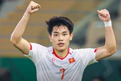 Dinh Bac celebrates after scoring the goal for Viet Nam. (Photo: VFF)