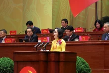 NA Vice Chairwoman Nguyen Thi Thanh delivers a presentation at the plenary discussion of the ongoing 14th National Party Congress on January 21. (Photo: VNA)
