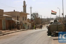 A military vehicle near Rawa City, close to the Iraq–Syria border area. (Photo: Xinhua)