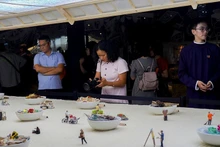 Visitors tour the Pho Museum on its opening day. (Photo: PHAM NGUYEN)