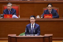 Minister of Science and Technology Nguyen Manh Hung delivers a presentation at the 14th National Party Congress, focusing on breakthrough solutions to make science and technology, innovation, and digital transformation the core drivers of a new, fast and sustainable growth model (Photo: VNA)
