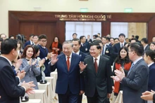 General Secretary of the CPV Central Committee To Lam and Party General Secretary and President of Laos Thongloun Sisoulith attend the briefing session on January 26. (Photo: VNA)