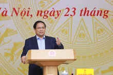 Prime Minister Pham Minh Chinh speaks at the 14th meeting of the National Steering Committee for Illegal, Unreported and Unregulated Fishing Prevention and Control. (Photo: VNA)