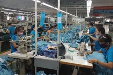 Garment production for export at Hanosimex Dong Van Garment Factory. (Photo: MINH DUC–TRINH BINH)