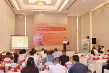 Representatives of enterprises and press agencies at the press briefing.