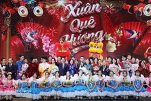 President Luong Cuong, his spouse, delegates and artists at the special Spring Homeland Art Programme 2026. (Photo: VNA)