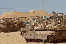 Israeli military vehicles have been deployed near the border with the Gaza Strip. (Photo: Xinhua/VNA)