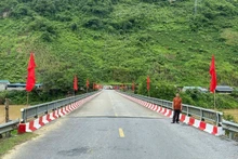 Pa Tan Bridge in the new Pa Tan Commune connects traffic between the former communes of Pa Tan, Nam Ban and Trung Chai. (Photo: nhandan.vn)
