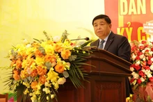 Deputy Prime Minister Nguyen Chi Dung addresses the Congress. (Photo: nhandan.vn)