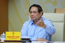 Prime Minister Pham Minh Chinh addressing the conference (Photo: VNA)