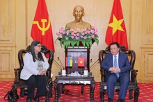 President of the Ho Chi Minh National Academy of Politics (HCMA) and Chairman of the Central Theory Council Professor Dr. Nguyen Xuan Thang meets with Venezuela’s Deputy Minister of Foreign Affairs in charge of Asia, the Middle East, and Oceania Tatiana Pugh Moreno in Ha Noi on October 23. (Photo: VNA)