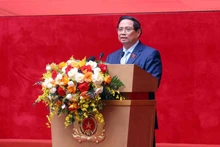 Prime Minister Pham Minh Chinh addressing the conference (Photo: VNA)