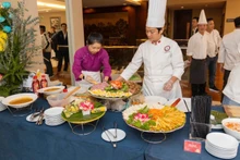 Guests experience cuisine after the press briefing.