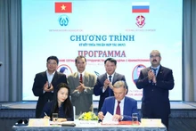 The signing ceremony of the cooperation agreement between the Viet Nam Notary Association and the Federal Notary Chamber of the Russian Federation.