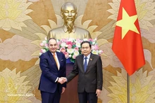 National Assembly Chairman Tran Thanh Man (right) receives First Vice President of the Hellenic Parliament Ioannis Plakiotakis in Ha Noi on March 2. (Photo: VNA)