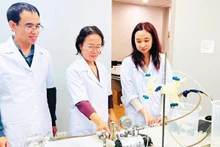 Professor, Dr Tran Thi Viet Nga (centre), Director of the Viet Nam–Japan Institute of Advanced Technology and Senior Lecturer at the Faculty of Environmental Engineering, Ha Noi University of Civil Engineering, was honoured with the Kovalevskaia Award 2025. Photo: LE THUY