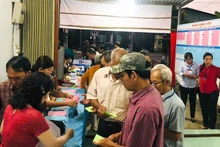 Voters in Cai Von Ward, Vinh Long Province, cast their ballots very early.