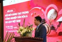 Dr Nguyen Trung Dung, Chairman of VNEI, delivering the opening remarks. (Photo: nhandan.vn)