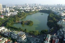 Hoan Kiem Lake, also known as the Lake of the Returned Sword, is a cultural landmark in Ha Noi. (Photo: VNA)