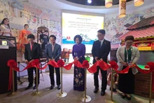 Delegates cut the ribbon at the opening of Quang Ninh Week at EXPO 2025. (Photo: Department of International Cooperation)