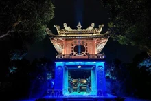 Khue Van Cac attracts tourists with its lighting effects and traditional art performances. (Photo: VNA)