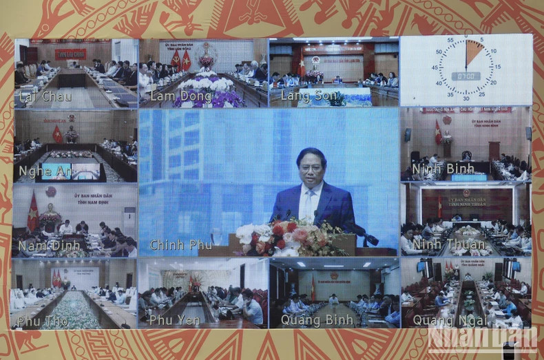 The event is connected with all the 63 provincial-level localities nationwide via videoconference. (Photo: NDO) The event is connected with all the 63 provincial-level localities nationwide via videoconference. (Photo: NDO)