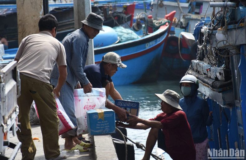 Food and drink are prepared by the fishermen for the first fishing trip. Food and drink are prepared by the fishermen for the first fishing trip.