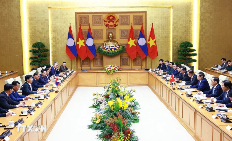 At the meeting between PM Pham Minh Chinh and Party General Secretary and President of Laos Thongloun Sisoulith (Photo: VNA) At the meeting between PM Pham Minh Chinh and Party General Secretary and President of Laos Thongloun Sisoulith (Photo: VNA)