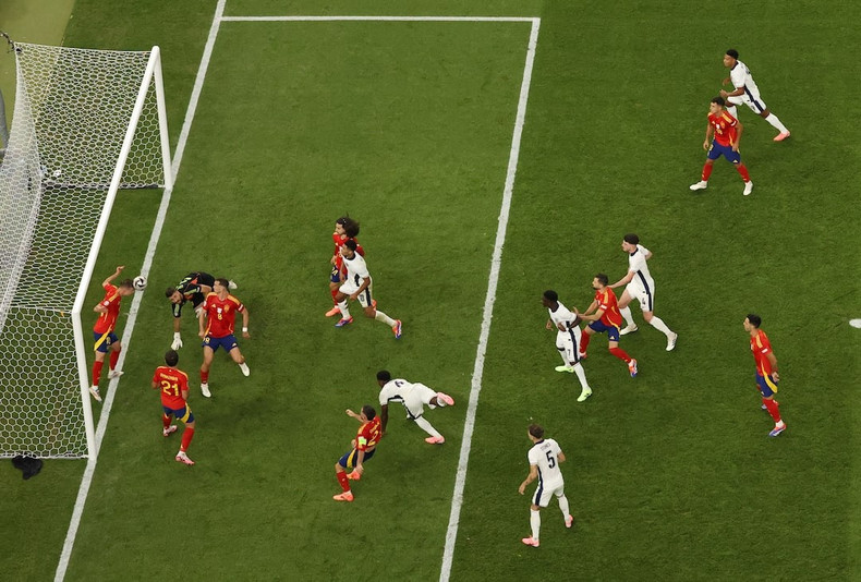 Spain’s Dani Olmo tries to block Marc Guehi’s shot. Spain’s Dani Olmo tries to block Marc Guehi’s shot.