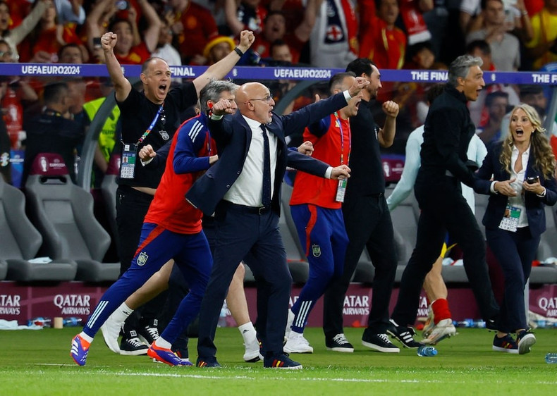 Spain's coach Luis de la Fuente rejoices as Spain wins the final. Spain's coach Luis de la Fuente rejoices as Spain wins the final.