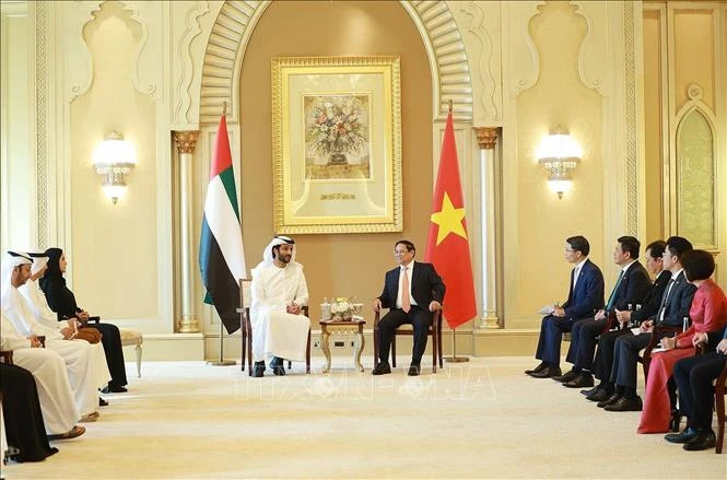 Prime Minister Pham Minh Chinh receives UAE Minister of Economy Abdulla Bin Touq Al Marri. (Photo: Duong Giang/VNA)