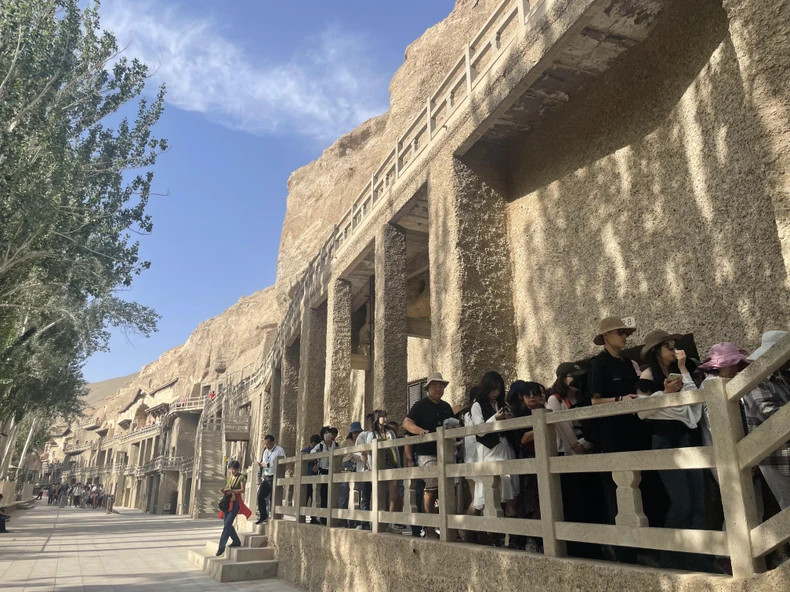 The Mogao Caves were listed by UNESCO as a World Heritage Site in 1987. The Mogao Caves were listed by UNESCO as a World Heritage Site in 1987.