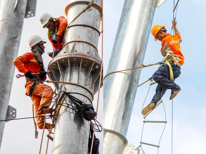 The erection of towers for the Circuit-3 500kV transmission line. (Photo: EVNICT)