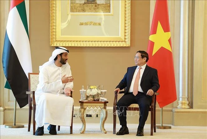 Prime Minister Pham Minh Chinh receives UAE Minister of Economy Abdulla Bin Touq Al Marri. (Photo: Duong Giang/VNA)