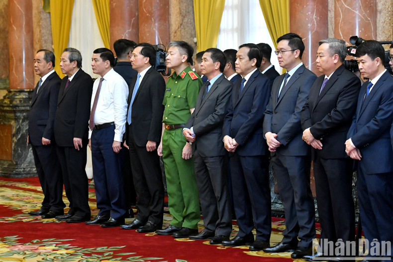 Delegates attend the ceremony.