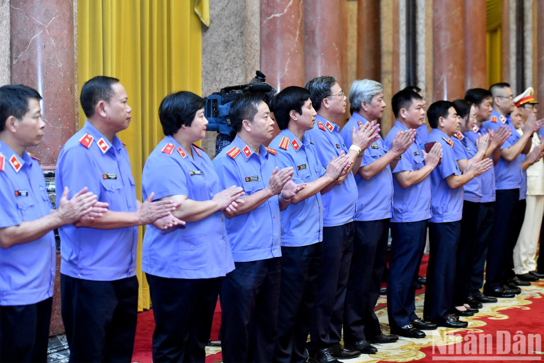 Delegates attend the ceremony.