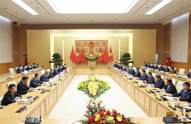 At the talks between Prime Minister Pham Minh Chinh and Chinese Premier Li Qiang. (Photo: VNA)