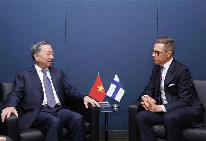 Party General Secretary and State President To Lam (L) and Finnish President Alexander Stubb. (Photo: VNA)