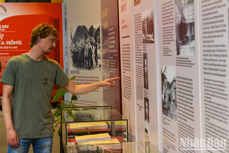 A foreign visitor learns about Vietnam's history at the exhibition space. A foreign visitor learns about Vietnam's history at the exhibition space.