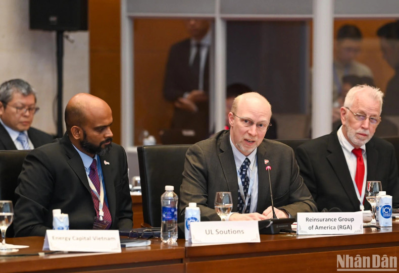 A representative from Reinsurance Group of America speaks at the reception.