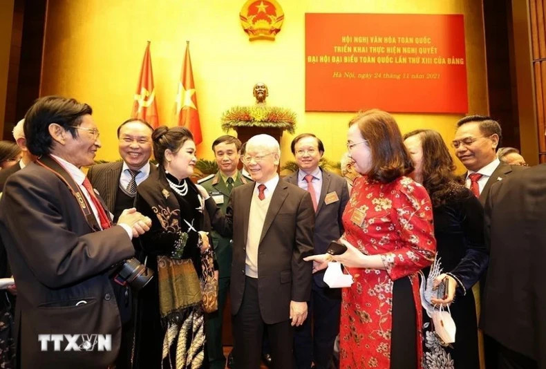 Party General Secretary Nguyen Phu Trong talks with delegates attending the National Cultural Conference to implement the 13th National Party Congress’ Resolution (November 24, 2021).